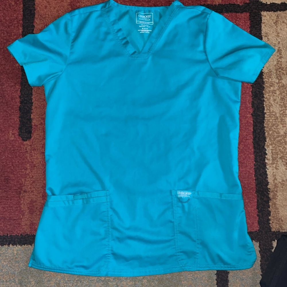 Woman's Cherokee Workwear Revolution Scrub Top